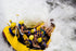 Raft dropping into whitewater on the Telaga Waja River in Bali