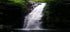 Beginner canyoning rappel at Yeh Lampah waterfall in North Bali