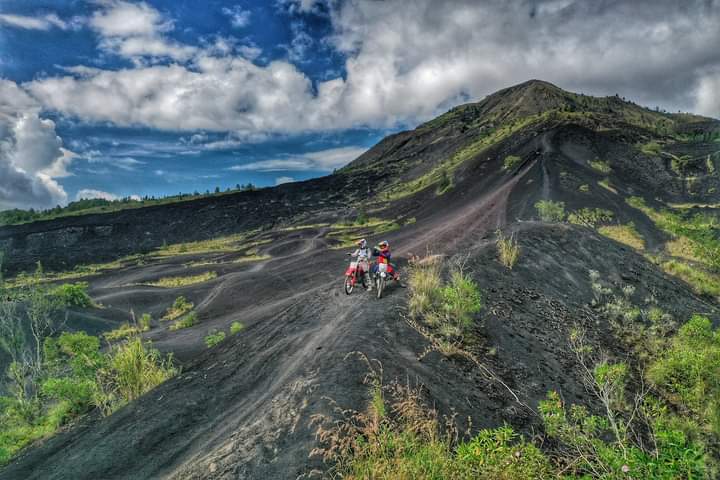 Off-road dirt bike riding in Bali jungle terrain