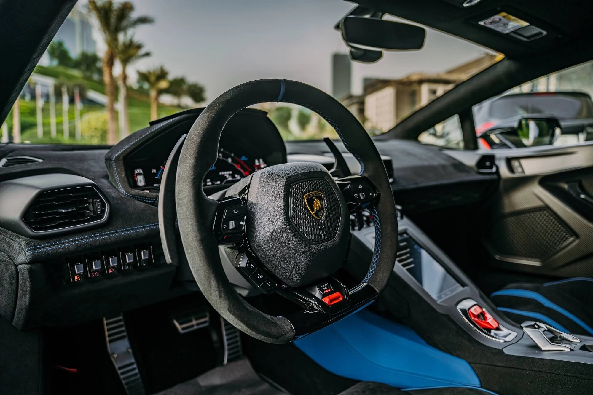 Experience the thrill of a 2022 Lamborghini Huracan STO Black Matt in Dubai. This luxury supercar boasts 640 horsepower, accelerates from 0 to 100 km/h in 2.8 seconds, and reaches a maximum speed of 310 km/h. With automatic transmission, feel the adrenaline on Dubai's roads. Enjoy an intimate driving experience with two seats for exclusivity.